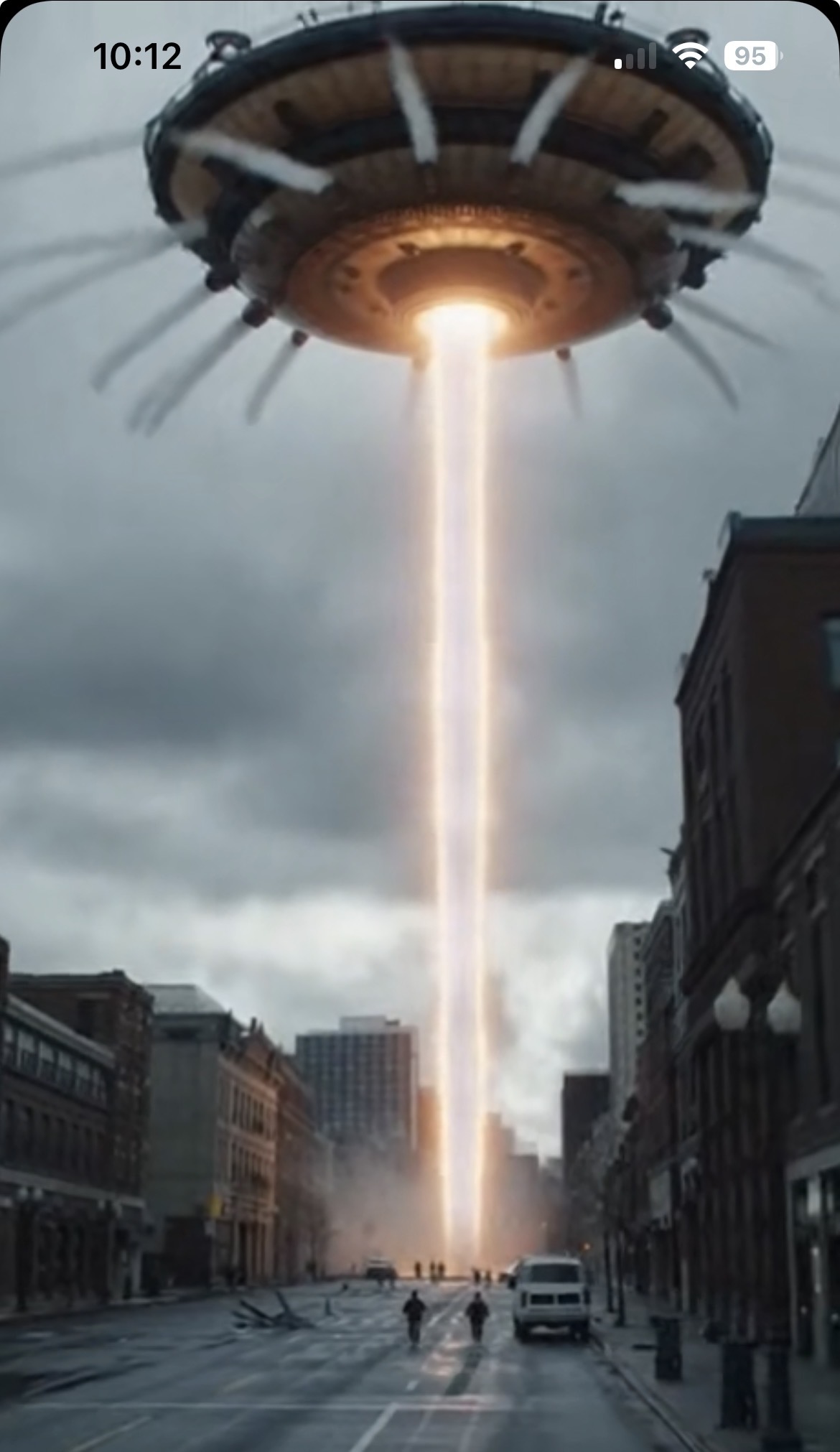 A hovering craft above city buildings firing a bright vertical beam.